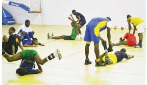 •VOLLEYBALL players exercising at the National Sports Development Centre in Lusaka in readiness for the 2014 World Cup qualifiers slated for Kenya. Picture by SHAMAOMA MUSONDA