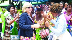 • VICE-PRESIDENT Guy Scott’s wife, Charlotte, dances with Patriotic Front supporters at Harry Mwaanga Nkumbula International Airport yesterday. Picture by BRIAN HATYOKA