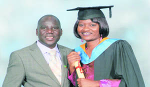 • Lt Col Muwina with husband Joseph Chishimba at her graduation from Copperbelt University.