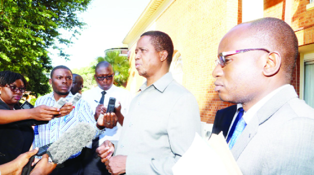 •PRESIDENT Edgar Lungu briefs journalists at State House yesterday on the Special Operational Order aimed at restoring law and order in parts of Lusaka, where suspected ritual murders have been recorded in recent weeks. On his left is his Special Assistant for Press and Public Relations, Amos Chanda. Picture by EDDIE MWANALEZA/STATE HOUSE