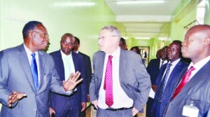 • VICE-PRESIDENT Guy Scott listens to Health Minister Dr Joseph Kasonde (left) as University Teaching Hospital Managing Director Dr Lackson Kasonka (right) looks on during Dr Scott’s visit to the hospital in Lusaka yesterday. Picture by STEPHEN KAPAMBWE