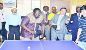 •SPORTS Minister Chishimba Kambwili and Chinese Ambassador to Zambia, Zhou Yaxiao test their ping-pong skills after China donated assorted sports equipment to the Zambia Table Tennis Association (ZTTA) in Lusaka yesterday. Picture by CLEVER ZULU