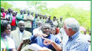 •LANDS Minister Harry Kalaba (centre) and Sable Transport Limited managing director Alloo Iqbal (right) charting the way forward on the long-standing land dispute between Sable and Rufunsa District villagers on Friday. Looking on (left) is Rufunsa Member of Parliament Kenneth Chipungu. Picture by CHUSA SICHONE.