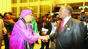 •PRESIDENT Michael Sata greets Liberian President Ellen Johnson Sirleaf during the 22nd Ordinary Session of the African Union closed session in Ethiopia on Friday Picture  By EDDIE MWANALEZA