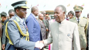 •PRESIDENT Michael Sata greets Zambia's military attaché in the Democratic Republic of the Congo Brigadier General Fredy Milamba before departure for Zambia yesterday. Picture by EDDIE MWANALEZA