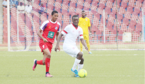 • NKANA’S Kelvin Mubanga (right) shields the ball from Felix Bardenhost of Mbabane Swallows during the Orange CAF Champions League preliminary round first leg match played at Somhlolo National Stadium in Mbabane yesterday. Picture by BODWA MBINGO
