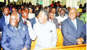 •PRESIDENT Michael Sata sits with former presidents Kenneth Kaunda (left) and Rupiah Banda during a Good Friday church service at St Ignatius church in Lusaka yesterday. Pictures by STEPHEN KAPAMBWE.