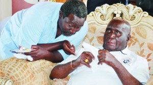 FIRST Republican President Dr Kenneth Kaunda (right) with his son Kaweche at home in Lusaka yesterday.