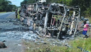 •THE remains of a NSUMI luxury coach which got burnt in Luansobe area on the Ndola-Kapiri Mposhi Road on the Copperbelt on Saturday last week. Picture by MUNAMBEZA MUWANEI.