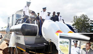 •HOME Affairs Minister Ngosa Simbyakula (insert) accompanied by Deputy Inspector General of Zambia Police Service Solomon Jere during an inspection of new Marine equipment in Lusaka which the Government has acquired for the Police Service. Picture by NAKUBIANA SHABONGO