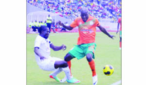 •ZESCO United defender, Daut Musekwa (right) battles with Power Dynamos midfielder, Emmanuel Chimpinde during the MTN Premier Division League Week Six match at Levy Mwanawasa Stadium in Ndola yesterday. Picture by MOSES CHIMFWEMBE