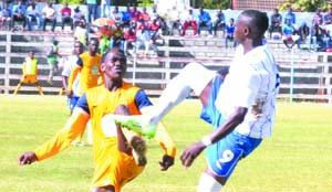 • NAPSA Stars defender Boyd Mkandawire (left) and Nchanga Rangers striker Patson Daka vie for an aerial ball during their MTN/FAZ Week 9 match played at Woodlands stadium in Lusaka on Saturday. Napsa Stars won 2 - 0. Picture by CLEVER ZULU.