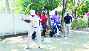 • LOCAL professional golfer Madalitso Muthiya tees off from hole number one during yesterday’s Airtel/Samsung Pro-AM at Nkana Golf Club in Kitwe. - Picture by MOFFAT CHAZINGWA.