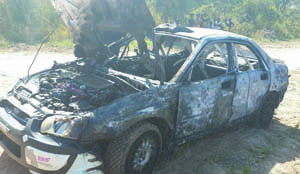 • REMAINS of Jassy Singh’s Subaru Impreza N10 that was engulfed in flames in Chisamba yesterday after developing an electric fault during the Airtel Money 2014 Zambia International Motor Rally. Picture courtesy ZAMBIA MOTOR SPORT ASSOCIATION