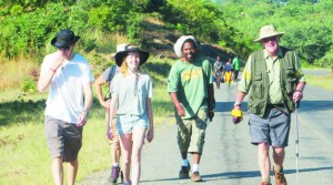 •DAVID Lemon (right) joined by well-wishers among them Zambian artist Alexis Phiri at the start of his second leg Zambezi Cowbell Trek in Siavonga last month. Picture Courtesy of Promasidor