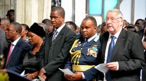 Vice-President Guy Scott (right), Zambia Air Force Commander Lieutenant General Erick Chimese, Defence Minister Edgar Lungu, Permanent Secretary Rosemary Salukatula and Justice Minister Wynter Kabimba (left) sing a hymn during the funeral service. Pictures by STEPHEN KAPAMBWE.