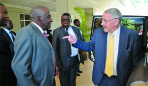 •VICE-President Guy Scott talks to professor Chintu after a ZACCAF meeting at Southern Sun Ridgeway.