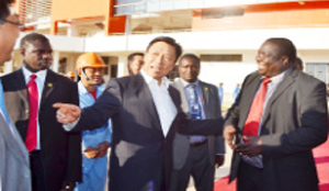 • VISITING Chinese vice-president Li Yuanchao (centre) and Youth and Sports Minister Chishimba Kambwili (with red tie) during the tour of the National Heroes Stadium in Lusaka on Thursday. Picture by CHUSA SICHONE.