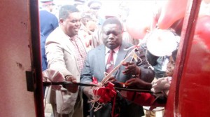 • TRANSPORT, Works, Supply and Communications, Minister Yamfwa Mukanga (left) flags off the first Zambia Railways Passenger Train between Kapiri Mposhi and Nakonde in Kapiri Mposhi yesterday. See story on Page 2. Picture by SUNDAY BWALYA /ZANIS