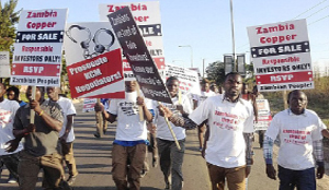 • PROTESTERS after Vedanta chairperson boasted about having bought KCM for a song and the company’s huge profits.