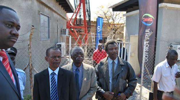 • INFORMATION and Broadcasting Minister Joseph Katema (second left), Ndola District Commissioner Rebby Chanda, Zambia National Broadcasting Corporation board member Cliven Katebe and corporate affairs manager Masuzyo Ndhlovu at the top of the Kaloko Hill in Ndola yesterday, during the launch of the ZNBC dual-cast television transmitter.