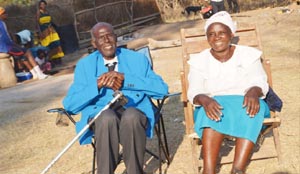 •MR Hatyoka and his wife Elizabeth, outside their house in Hamukanchali Village in Monze during his 100th birthday celebrations.