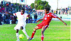 • NKANA striker Evans Kangwa (left) takes on Red Arrows defender White Simwanza during their MTN/FAZ Super Division match played at Nkoloma Stadium in Lusaka recently. Picture by CLEVER ZULU