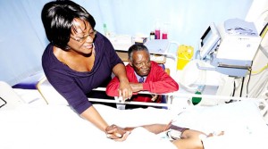 •PRESIDENT Sata and First Lady Dr Christine Kaseba on their son Kazimu’s bedside at Milpark Hospital in South Africa, where he is admitted for specialist treatment.