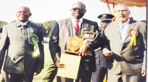 •FIRST Quantum Minerals (FQM) has for the second year running won the 2014 Zambia International Trade Fair (ZITF) Best mining exhibition award. From left, Commerce Trade and Industry Minister Robert Sichinga,   Kansanshi Mine Public relations manager Godfrey Msiska,  and Vice-President Dr Guy Scott during presentation of the award on Saturday. Pictures courtesy of FQM