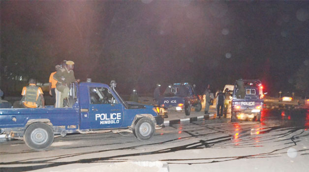 . POLICE in Kitwe fought running battles with Copperbelt University students on Friday who were protesting over allowances. Above, officers patrol the area. Picture By THOMAS KAPUMPE