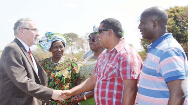 • Mangango by-election Patriotic Front campaign manager, Obvious Mwaliteta greets Vice-President Guy Scott on arrival at Kaoma Airstrip yesterday. Right to left, is Mines Deputy Minister Richard Musukwa, Community Development, Mother and Child Health Minister Emerine Kabanshi and Gender Minister Inonge Wina. Picture by SYLVESTER MWALE