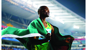 • ZAMBIA’S Sydney Siame celebrates12 after winning a gold medal in the 200m men’s final on Saturday, at the on-going Nanjing 2014 Youth Olympics in China. Picture courtesy of GETTY IMAGES