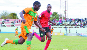• FLASHBACK...ZAMBIA Under-20 forward Dave Daka (LEFT) tries to outrun Mozambique defender Solomao Mondlane during the Senegal 2015 African Youth Championship qualifier at Nkoloma Stadium in Lusaka. Zambia knocked out Mozambique 4-0 on aggregate over two legs to reach the final round of qualifiers. Picture by CLEVER ZULU