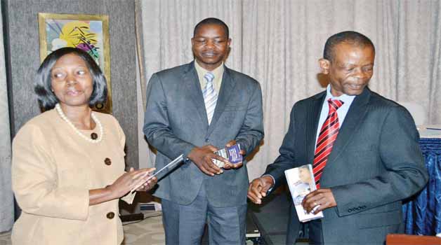 • Information and Broadcasting Services Minister Joseph Katema (right), his deputy Poniso Njeulu and Independent Broadcasting Authority (IBA) Director General Josephine Mapoma (left) at the launch of the IBA code of ethics at Radisson Blu hotel in Lusaka yesterday.