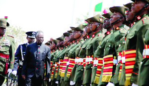 •PRESIDENT Michael Sata inspects a guard of honour at Parliament grounds in Lusaka yesterday. Picture by STEPHEN KAPAMBWE.