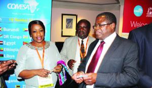 •MINES, Energy and Water Development minister Christopher Yaluma interacting with Common Market for Eastern and Southern Africa (COMESA) staff on the sidelines of the “Africa down under “conference in Perth, Australia. Picture courtesy COMESA ?