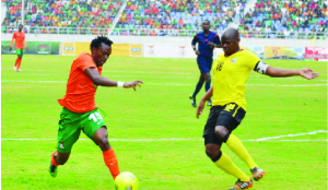 • CHIPOLOPOLO striker Given Singuluma (left) dribbles past Mozambique defender Dario Khan during last weekend’s Morocco 2015 Africa Cup of Nations (AFCON) Group F qualifier played at Levy Mwanawasa Stadium in Ndola. The match end 0-0. Picture by CLEVER ZULU
