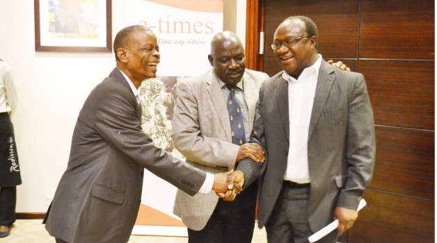 • INFORMATION and Broadcasting Services Minister Joseph Katema (left), Permanent Secretary Bert Mushala (centre) and Times Printpak Board chairperson Michael Musonda during the launch of the e-Times at Radisson Blu Hotel in Lusaka. Picture by STEPHEN KAPAMBWE