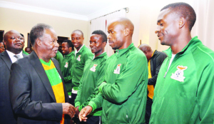 • FLASHBACK: LATE President Michael Sata interacting with Chipolopolo players when he visited the Zambian team during the 2013 Africa Cup of Nations in South Africa. Picture by THOMAS NSAMA/STATE HOUSE