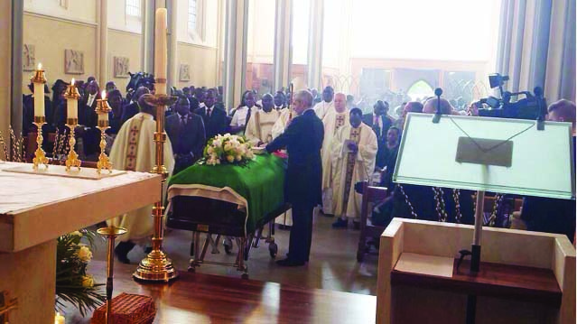 • Late President Michael Sata’s casket draped in a Zambian flag during a requiem service in London yesterday.
