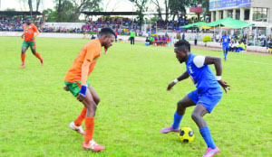 • KABWE Warriors striker Jacob Phiri (right) tries to dribble past Zesco United defender Nyambe Mulenga during the MTN-FAZ premier league week 30 match played at Trade Fair Grounds in Ndola on Saturday. Zesco won 3-1. Picture by MOSES CHIMFWEMBE