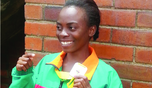 • ZAMBIA’S 200 metres runner, Abigail Sepiso displays the silver medal she won at the African Union Sports Commission Region Five Youth Games in Zimbabwe where she timed 25.16 seconds.