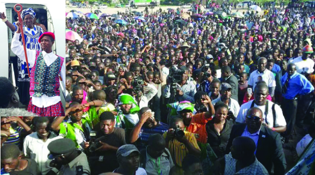 • Part of the crowd which attended the rally in Mongu yesterday. (Inset) PATRIOTIC Front presidential candidate, Edgar Lungu with party chairperson Inonge Wina alight from a plane for a campaign rally in Mongu yesterday.