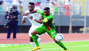 • ISSAMPA Djos of DR Congo battles with Rainford Kalaba of Zambia during the 2015 Africa Cup of Nations match at Ebibeyin Stadium, Equatorial Guinea on Sunday. Picture SYDNEY MAHLANGU/BACKPAGEPIX