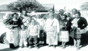 • MS Chipalo (with a black head dress) poses with children, great grand children and grand children on the eve of her 80th birthday