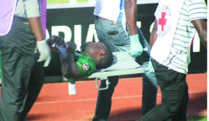 • CHIPOLOPOLO striker Emmanuel Mayuka being stretched off the pitch after sustaining an injury during Zambia’s 2-1 defeat by Tunisia in the ongoing 2015 Africa Cup of Nations. Picture courtesy of GETTY IMAGES
