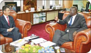 • HOME Affairs Minister Davies Mwila (right) speaks to Chinese Ambassador to Zambia Yang Youming. This was when Mr Yang called on Mr Mwila at his office in Lusaka yesterday. Picture by CHUSA SICHONE
