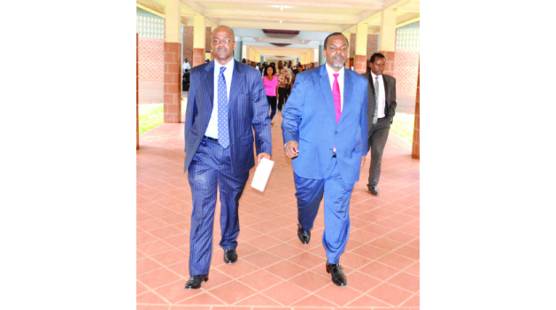 • DIRECTOR of Public Prosecutions (DPP) Mutembo Nchito (right) and his brother Nchima leave the Lusaka Magistrate Court complex in Lusaka yesterday. Picture by CLEVER ZULU