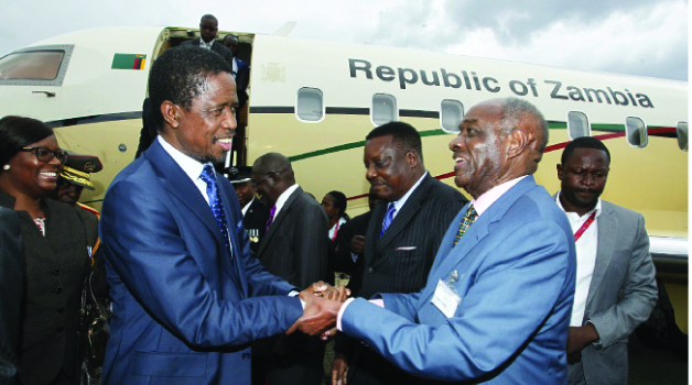 • PRESIDENT Edgar Lungu being welcomed by veteran politician Vernon Mwaanga at Hosea Kutako International Airport in Windhoek Namibia yesterday. President Lungu is in Windhoek to attend the 25th Independence celebrations and Inauguration of the third President of Namibia. Picture by SALIM HENRY/ STATE HOUSE.