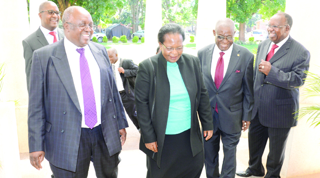• CHIEF Justice Irene Mambilima (centre) shares a light moment with Tribunal members (from right to left) Justice Enerst Sakala, Justice Aniel Silungwe, Justice Matthew Ngulube and Matthews Zulu after the swearing-in-ceremony at the High Court in Lusaka yesterday. Picture by CLEVER ZULU